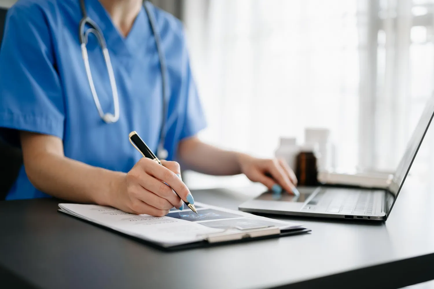medical-professional-writing-notes