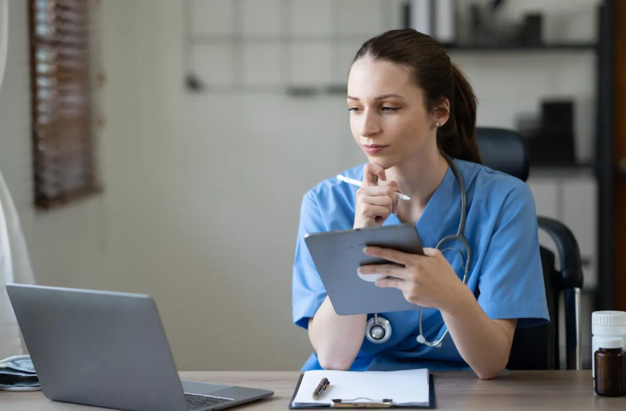 nurse-using-mobile-phone-in-clinic