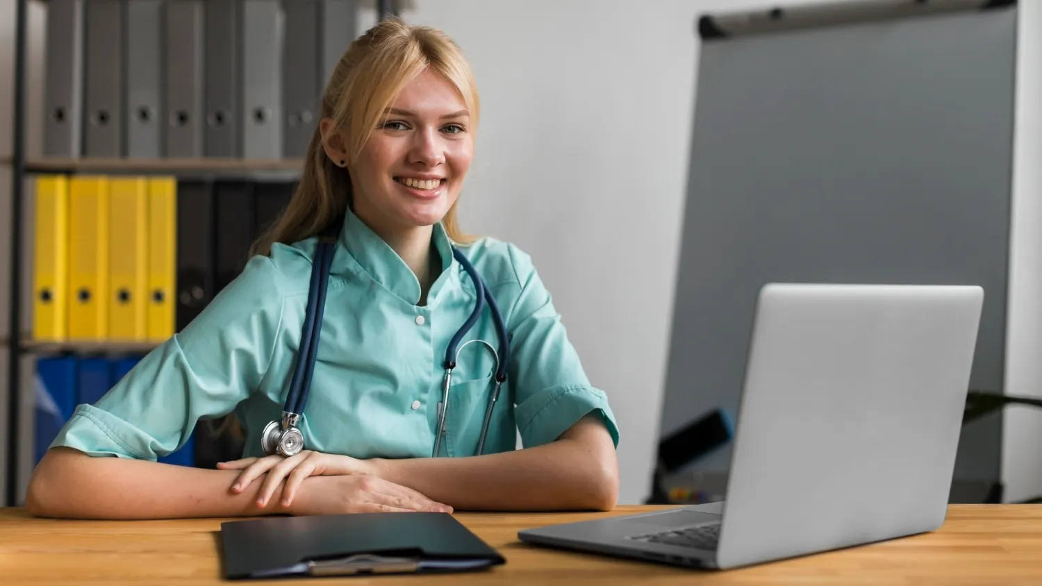 nurse-using-laptop-indoor