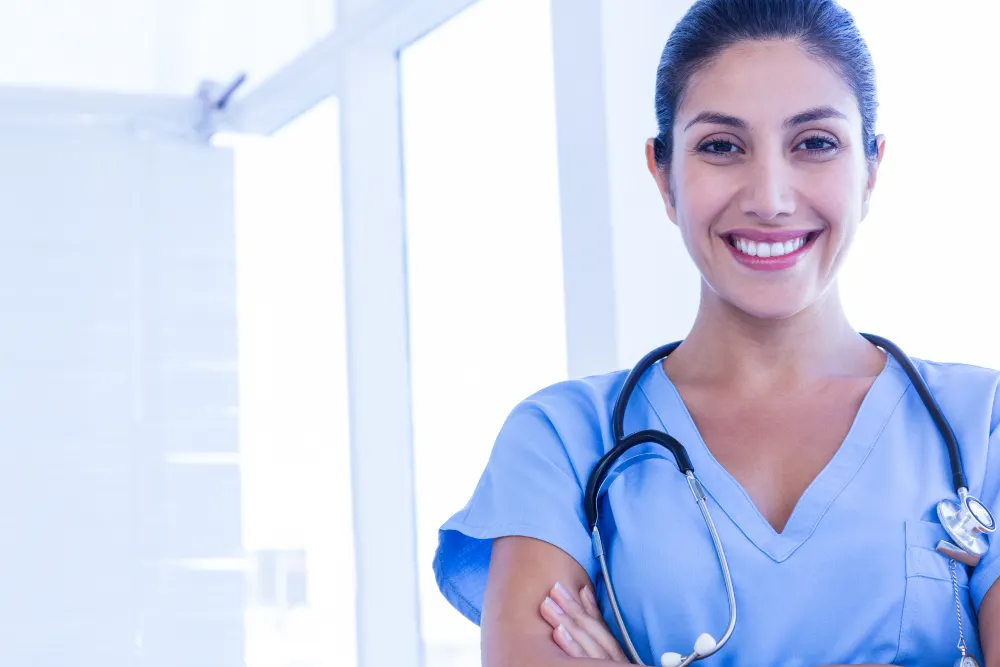 smiling-nurse-portrait-in-clinic-radha-patel-np-reviews